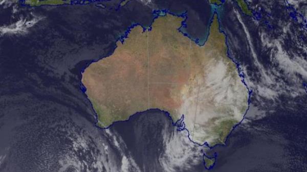 A thick cloud band forming over Australia<em></em>’s biggest cities heralds a cold and wet start to school holidays in NSW and the ACT. Picture: BOM