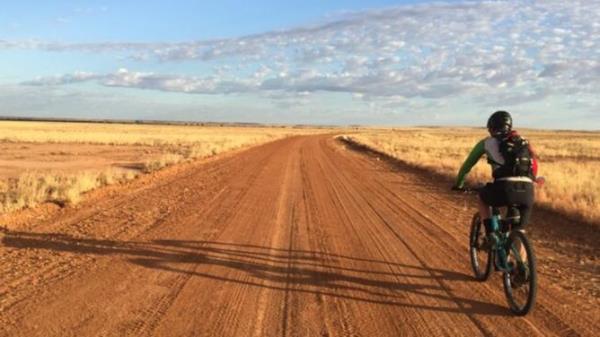 Andrew Kerec riding on a country road