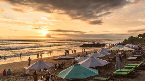 sunset in a beach bar in Canggu beach, just north of Kuta and Seminyak in Bali, Indonesia