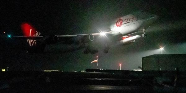 A Virgin Atlantic Boeing 747, codenamed Cosmic Girl, and carrying Virgin Orbit's LauncherOne rocket, takes off from Spaceport Cornwall at Cornwall Airport, Newquay, on January 9, 2023. 