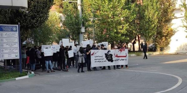 In this photo taken by someone not employed by the Associated Press and obtained by the Associated Press outside Iran, Sharif University of Technology students are shown attending to a protest sparked by the September death of 22-year-old Mahsa Amini in the custody of the country's morality police. .