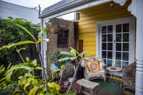 Marion Fredriksson at her Mosman Park home which is blooming with succulents and quirky pots. Kelsey Reid