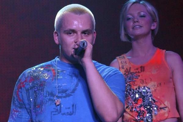 FILE - Paul Cattermole and fellow band mate Hannah looks on as they perform with pop group S Club 7 on stage at Wembley Arena in London, Feb. 14, 2002. Cattermole, a member of early-2000s British pop group S Club 7, has <p><p class=